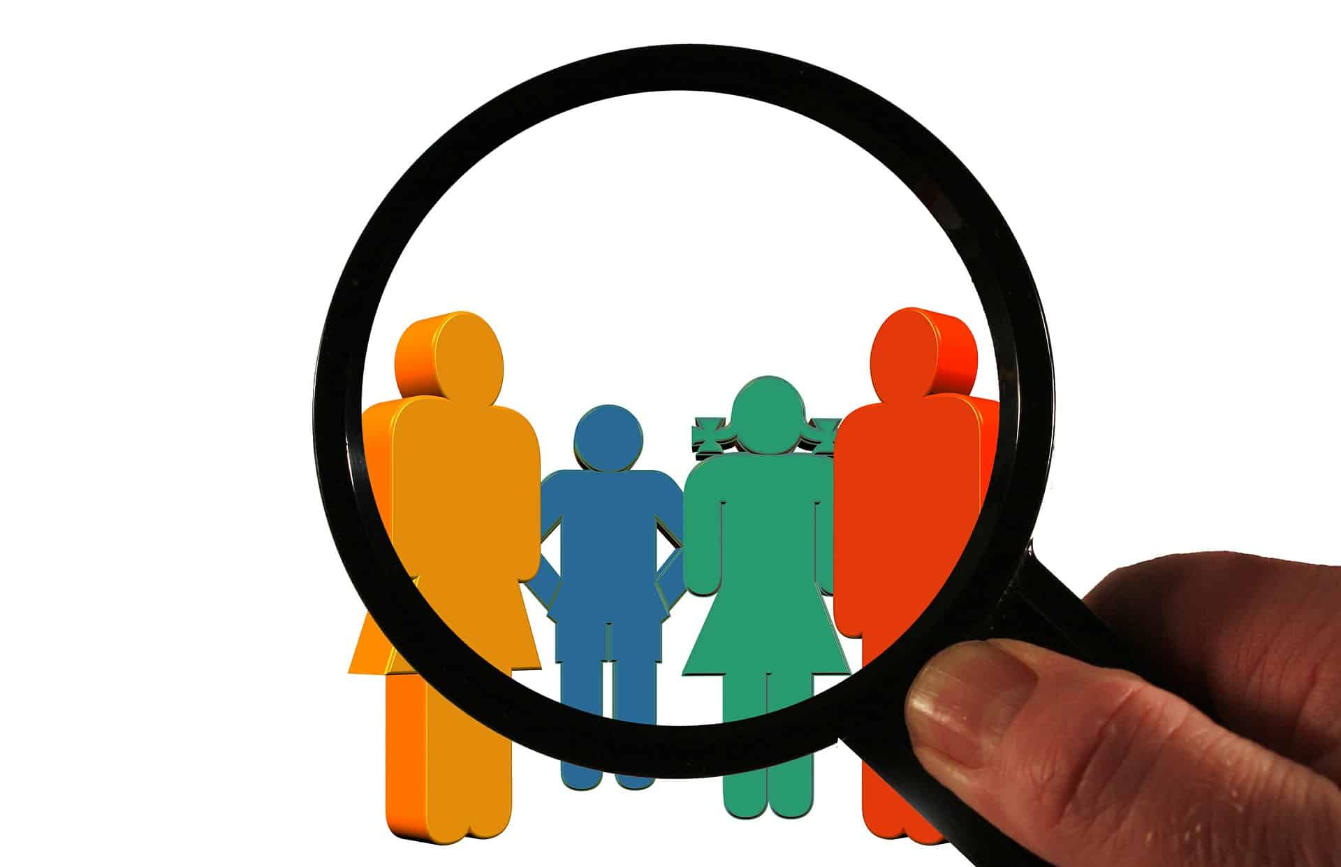 A magnifying glass in front of different people, representing the importance of customer segmentation